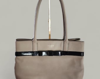 Kate Spade soft tan leather with patent leather black bow shoulder bag.