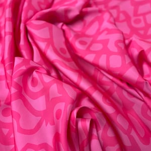 Pink Creative Lines Silk Satin Fabric: Soft Flowing Dress Material