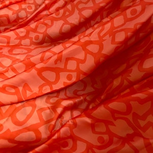 Creative Lines Silk Satin Fabric , Orange Soft Flowing Dress Fabric