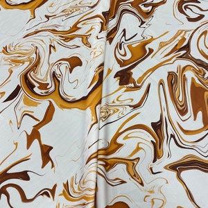 Batik Silky Satin Fabric in cream brown tones