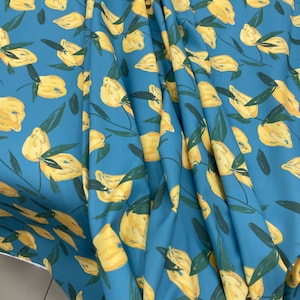 Lemon Print Silky Crepe Fabric: Luxury Apparel Fabric
