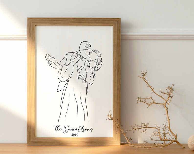 May include: A black and white line drawing of a couple dancing, with the man holding the woman close. The text "The Donaldsons 2019" is below the couple.