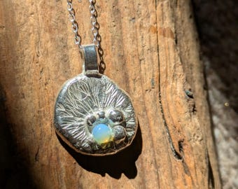 Silver and opal pebble