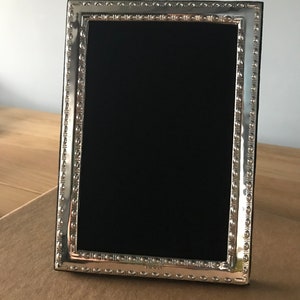Sterling Silver Photograph Frame. 6”x4”. Contemporary beaded style. Hallmarked in London. Beautiful black velvet back. Hand made in England.