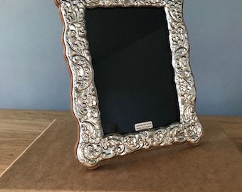Sterling 925 Silver Photograph frame. Fully Hallmarked in London. Picture size 6”x4” Hand made in England.