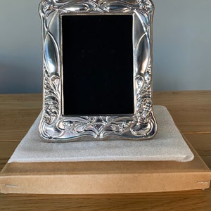 Sterling Silver Photograph Frame. Art Nouveau style. Picture size 6”x4”. Fully hallmarked in London. Hand made in England.