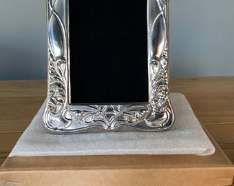 Solid Silver Photograph Frame. Art Nouveau style. Picture size 6”x4”. Fully hallmarked in London.