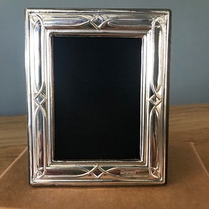 Sterling silver 925 Photograph Frame. Fully Hallmarked in London. Picture size approx 4” x 2.75”.