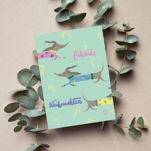 Weihnachtskarte zufriedene Dackel A6 türkis | lustige Weihnachtskarte mit Dackel | Weihnachtskarte mit Hunden | Karte Dackel witzig