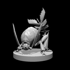 May include: A grey, detailed, 3D printed miniature of a creature with a segmented body, long legs, and a spiky tail. The creature has a menacing expression and appears to be in a defensive posture.