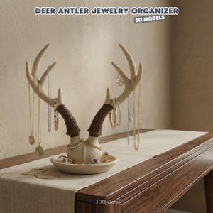 May include: A cream-colored deer antler jewelry organizer with brown antlers and a small dish at the base. The organizer holds various necklaces, earrings, and rings. The text at the top says "DEER ANTLER JEWELRY ORGANIZER 3D MODELS".