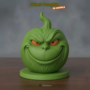 Puede incluir: Modelo 3D de una calabaza verde Grinch con ojos naranjas y una sonrisa traviesa. La calabaza está sobre una base verde, con el texto "Grinch Pumpkin 3D MODELS" en la parte superior. Una decoración única para Halloween o Navidad.