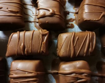 Chocolate coated caramel toffees box of 9