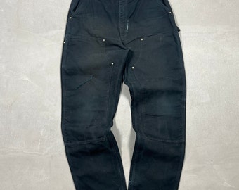 pantalon de menuisier noir délavé Carhartt vintage / vêtement de travail / streetwear - 34 x 36