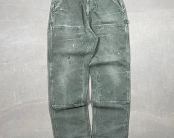 Vintage Carhartt pantalones de carpintero de doble rodilla verde descolorido / ropa de trabajo / ropa de calle - 34 x 34