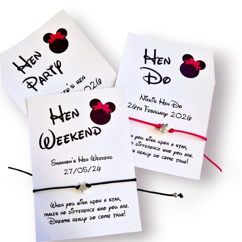 May include: Three white cards with black text and a Minnie Mouse silhouette with a pink bow. The cards read "Hen Party", "Hen Weekend", and "Hen Do". Each card has a bracelet attached.