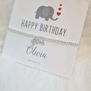 Tarjeta de elefante personalizada de feliz cumpleaños I pulsera chapada en plata y dije de elefante plateado