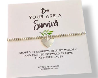 Pulsera inspiradora de plata para supervivientes: Joyería artesanal que simboliza la resiliencia.