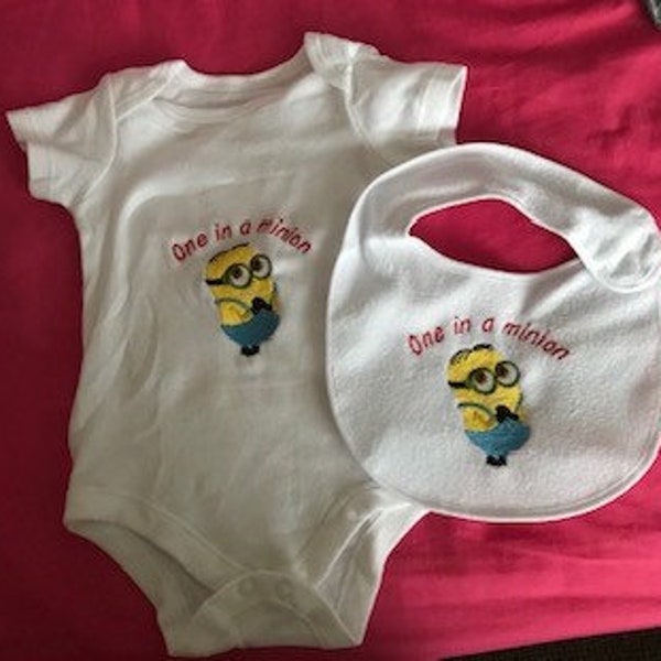 One in a minion baby vest and bib set