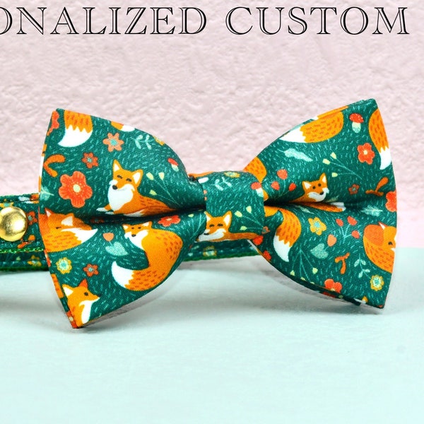 May include: A green and orange cat collar with a fox print bow tie and a bell charm. The collar is personalized with the text "ENGRAVED PET ID TAGS / PERSONALIZED CUSTOM".