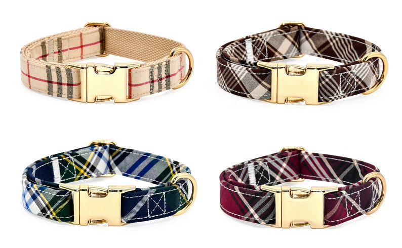 May include: Four dog collars with plaid patterns in different color combinations. The collars have gold-colored buckles and D-rings.