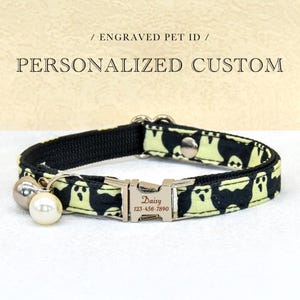 May include: A personalized pet collar with a black and light green ghost pattern. The collar has a silver buckle engraved with the name "Daisy" and a phone number. Includes a silver bell and a white pearl charm. Text on the image reads "Engraved Pet ID" and "Personalized Custom".