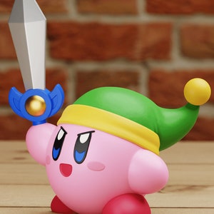 May include: A pink and white character with a green hat and a blue sword. The character has a yellow headband and a yellow and blue sword.