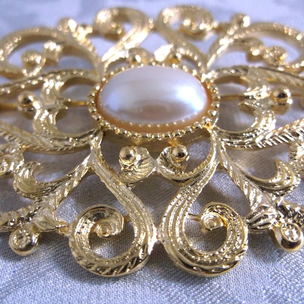 Scrolled Gold Tone Brooch with Faux Pearl  Brooch stamped with PD Crown