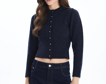 Gebreid vest en trui met lange mouwen en details in marineblauw