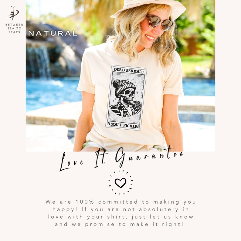 May include: A beige t-shirt with a black and white graphic of a skeleton wearing a beanie and eating a pickle. The graphic is surrounded by a white border and has the text "Dead Serious About Pickles". The t-shirt has a crew neck and short sleeves.