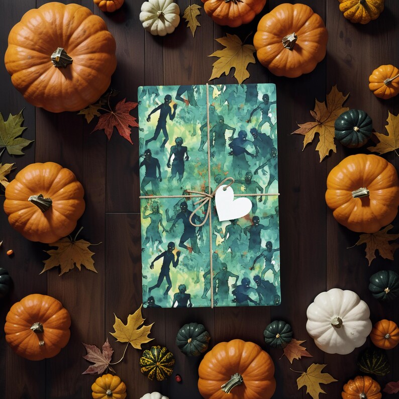 May include: A green and blue wrapping paper with a pattern of zombies. The paper is wrapped around a gift box and tied with a string. A white heart-shaped tag is attached to the string.