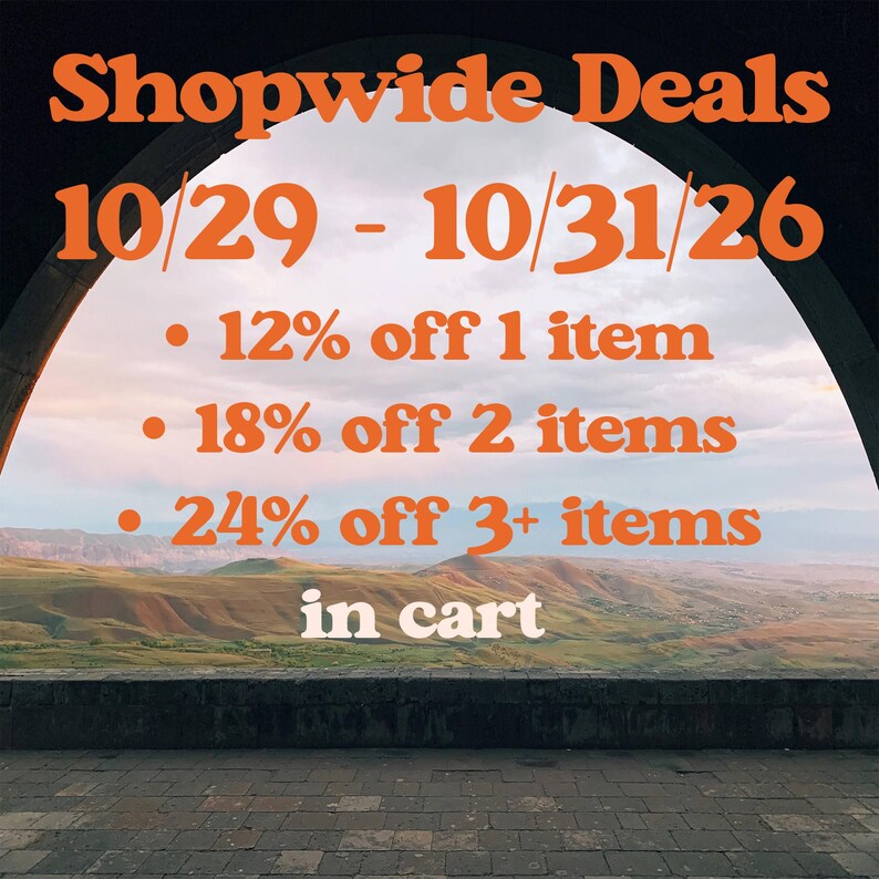 an advertisement for a store with a picture of mountains in the background