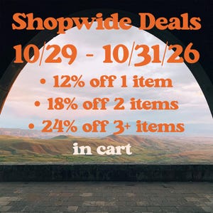 an advertisement for a store with a picture of mountains in the background