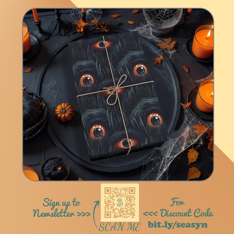 May include: A black gift box with a spooky eye pattern wrapped in brown paper and tied with twine. The box is sitting on a black plate with a spiderweb design. There are two lit candles in the background. The text "Sign up to Newsletter >>" and "For Discount Code << bit.ly/seasyn" is visible at the bottom of the image.