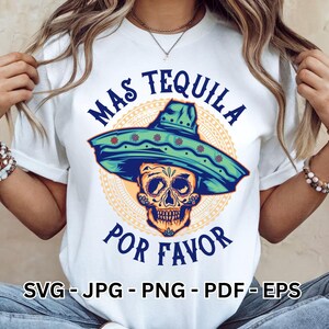 May include: A white t-shirt featuring a graphic of a sugar skull wearing a large green sombrero. The text "MAS TEQUILA POR FAVOR" is printed in blue around the skull. Below the graphic, the text "SVG - JPG - PNG - PDF - EPS" is visible.