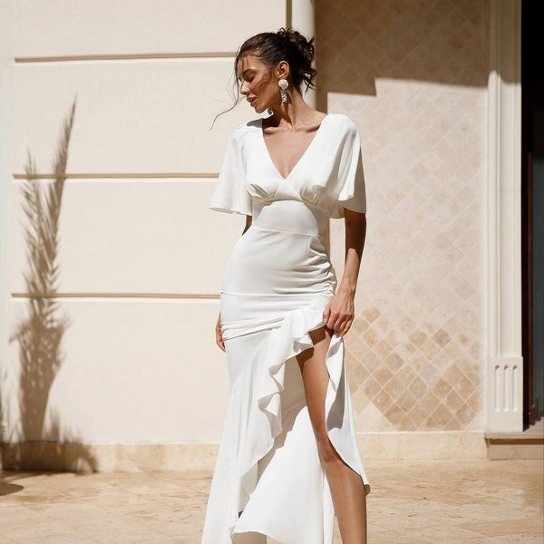 Gorgeous white maxi women's dress with ruffles and side slit. Performance dress, wedding guest dress, bridesmaid dress.