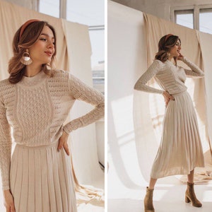 Cozy beige formal sweaterdress knit dress. Midi knitted cotton dress. Warm knitted women's wear. Knitted dress with pleated skirt.