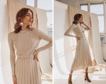 Cozy beige formal sweaterdress knit dress. Midi knitted cotton dress. Warm knitted women's wear. Knitted dress with pleated skirt.