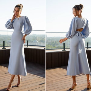 Sky blue women's event dress with puffy short sleeves and open back.Backless  blue midi dress. A-line Wedding guest dress with short sleeves