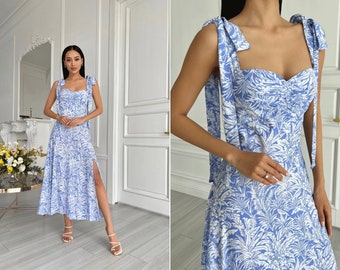 Summer floral cotton dress with flared skirt and side slit. Midi Cotton summer dress in blue floral pattern