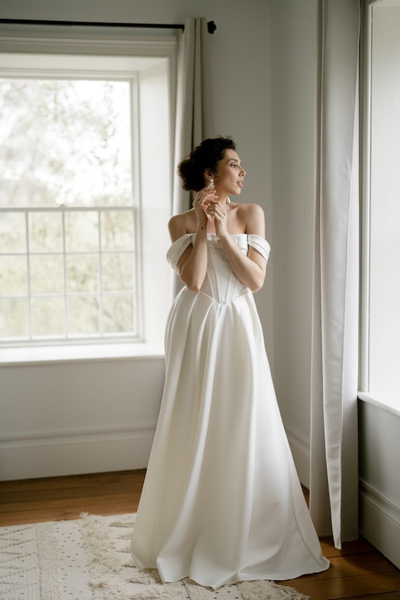 Vintage Cinderella Wedding Gown: Ivory Corset Dress with Pleated Skirt