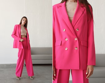 Fuchsia pink casual blazer and palazzo pant suit. Masculine-cut blazer and wide-leg Palazzo pants suit. Women loose fit two-piece suit
