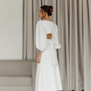 Gift For Her. Stunning women&#39;s event dress with puffy short sleeves and open back.Backless white midi dress. A-line Wedding guest dress