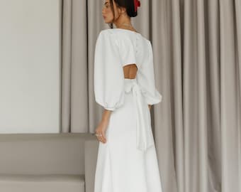 Robe midi blanche : robe de soirée trapèze dos nu avec manches bouffantes
