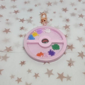 Pkmn pink shaker pokeball keychain