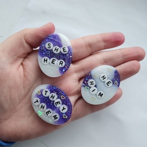 Purple and White Resin Pronoun Badges