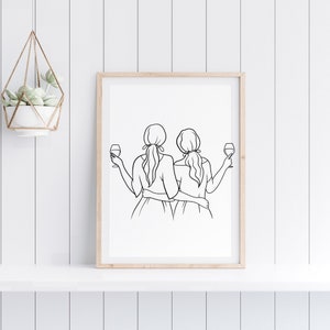 May include: Line art print of two women holding wine glasses, standing back to back with their arms around each other.
