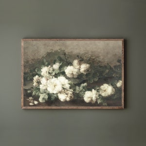 May include: A framed painting of a still life featuring a bouquet of white roses with green leaves against a muted brown background.