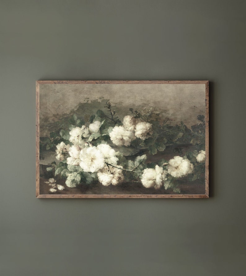 May include: A framed painting of a still life featuring a bouquet of white roses with green leaves against a muted brown background.