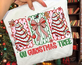 May include: White Christmas-themed pillow with a colorful design. The design includes a red and white striped bow, Christmas trees, snowflakes, and the text "OH CHRISTMAS TREE" in green and red.